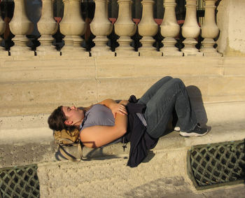 Full length of man lying on floor