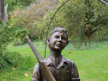 Portrait of man wearing mask against trees