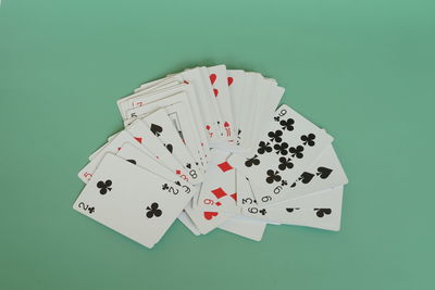 High angle view of decoration on table against blue background
