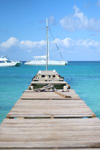 Ship on sea against blue sky