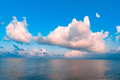 Scenic view of sea against blue sky