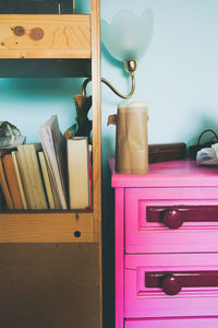 Close-up of lamp on table at home