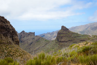 Scenic view of mountains against sky