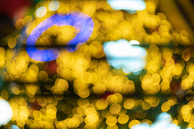 Defocused image of illuminated christmas lights