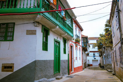 Alley amidst houses