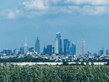 View of buildings in city against sky