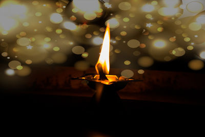 Close-up of burning candle