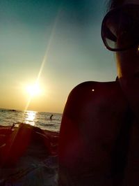 Scenic view of sea at sunset