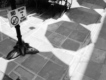 High angle view of bicycle on tiled floor