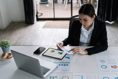 Business colleagues working on table