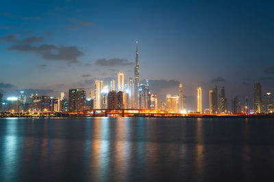 Dubai skyline during sunset dusk and night series from the water canal