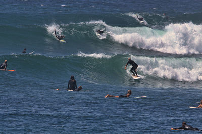 People enjoying in sea