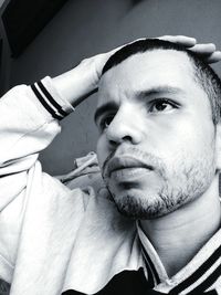 Close-up portrait of man smoking