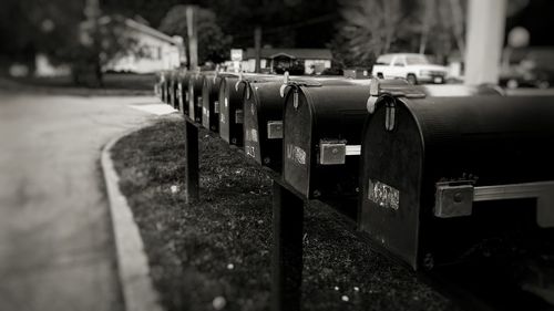 Close-up of mailboxes by street