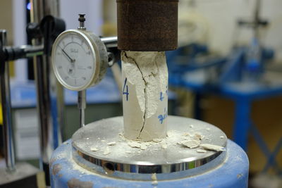 Close-up of pressure gauge in factory