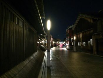 View of illuminated street at night