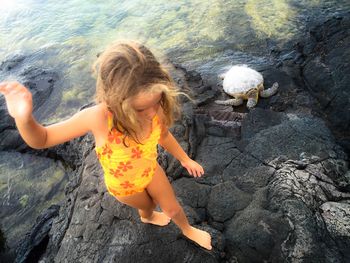 Close-up of woman standing in pond