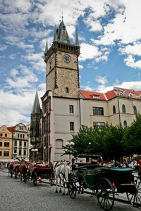 Buildings in city against sky