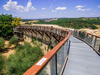 Bridge over river against sky