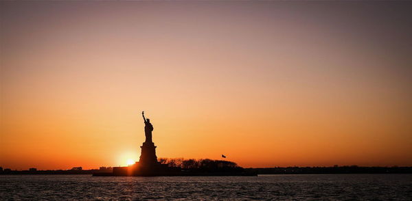 Statue of liberty at sunset