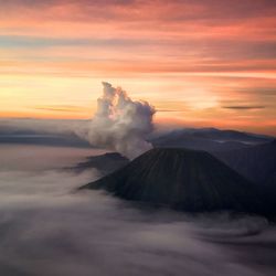 Scenic view of landscape against sky during sunset