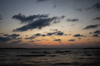 Scenic view of sea against sky at sunset