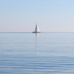 Boat sailing in sea