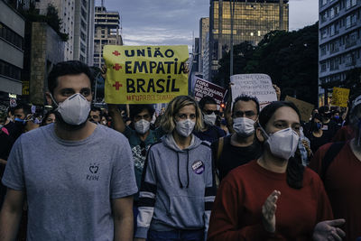 Group of people on street in city