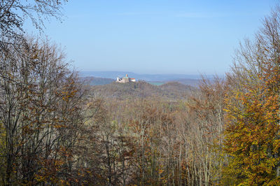 Scenic view of sea against clear sky during autumn