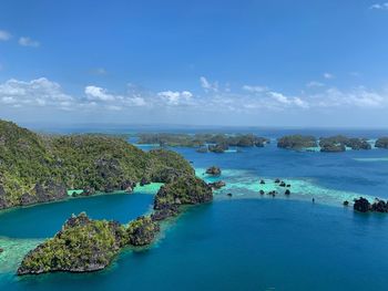 High angle view of sea against sky lagoon in raja ampat archipelago 