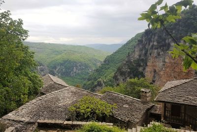 Scenic view of landscape and mountains against sky