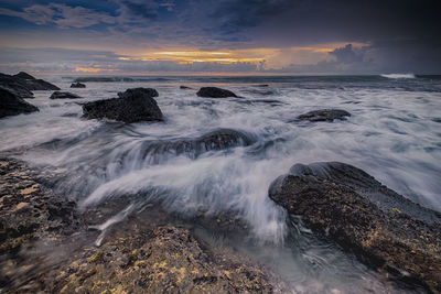 Scenic view of sea against sky during sunset