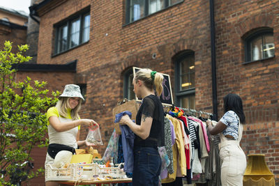 Young women at yard sale