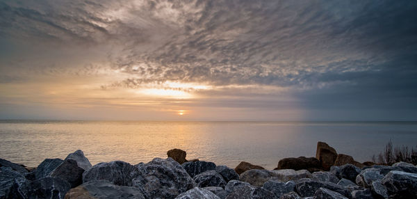 Scenic view of sea against sky during sunset