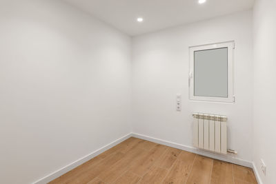 Empty room with frosted glass to avoid watching by neighbours. 