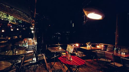 High angle view of illuminated restaurant table at night