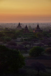 View of temple building against sky during sunset