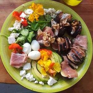 High angle view of chopped vegetables in plate on table