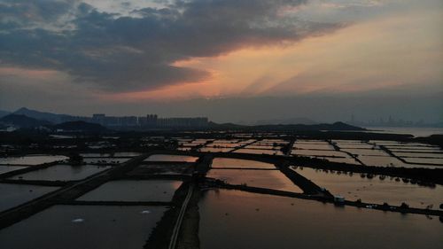 High angle view of cityscape against sky during sunset