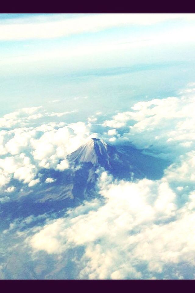 scenics, beauty in nature, sky, tranquil scene, tranquility, nature, aerial view, cloudscape, cloud - sky, mountain, majestic, cloud, landscape, idyllic, mountain range, blue, cloudy, day, white color, no people