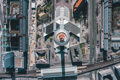 Clock tower amidst buildings in city