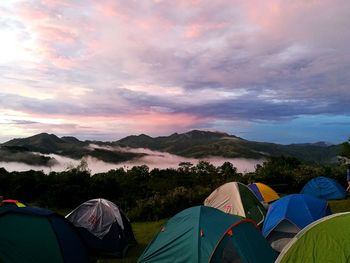 Scenic sea of clouds and pink sky at the camp site