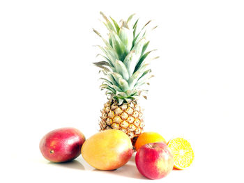 Close-up of fruit on white background