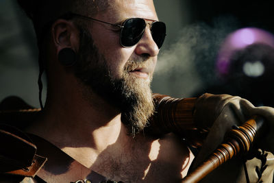 Close-up of young man smoking