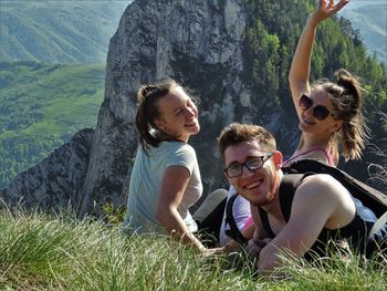 Portrait of happy friends on mountain