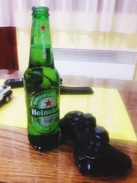 Close-up of beer bottles on table