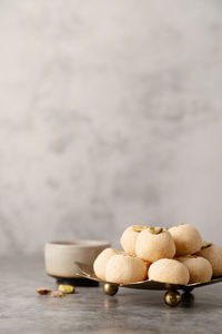 Traditional indian sweets burfi on concrete background