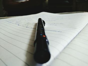 Close-up of pen on table