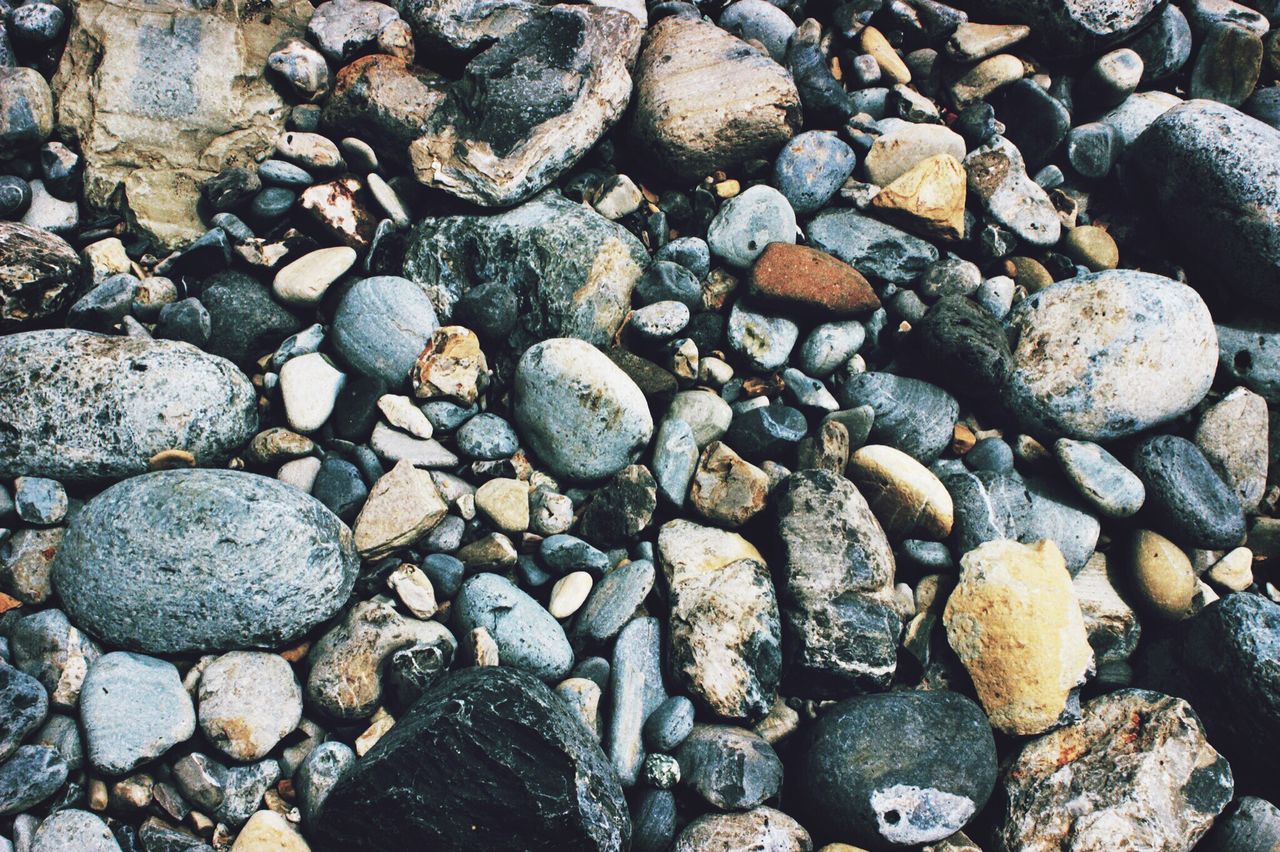 pebble, pebble beach, beach, shore, nature, full frame, no people, large group of objects, beauty in nature, outdoors, backgrounds, day, close-up