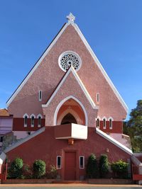 Facade of building against sky